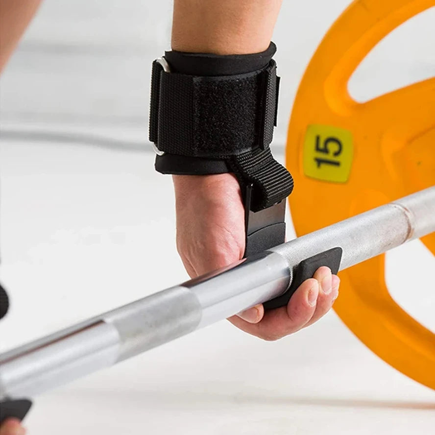 Close-up of a hand holding a loaded barbell while wearing a Vanta hook